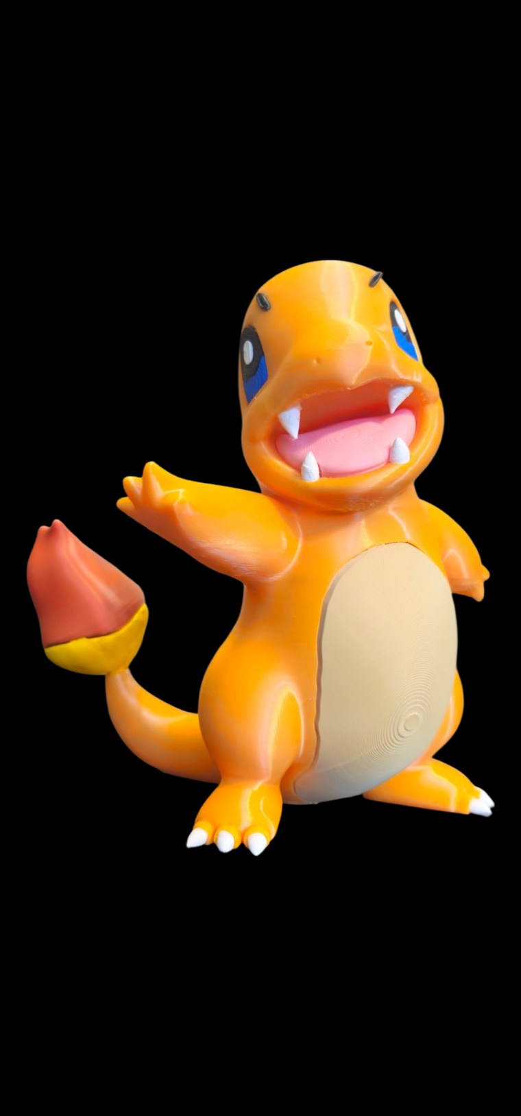 Glossy orange Charmander figure with a big open smile, cream belly and flame-tipped tail