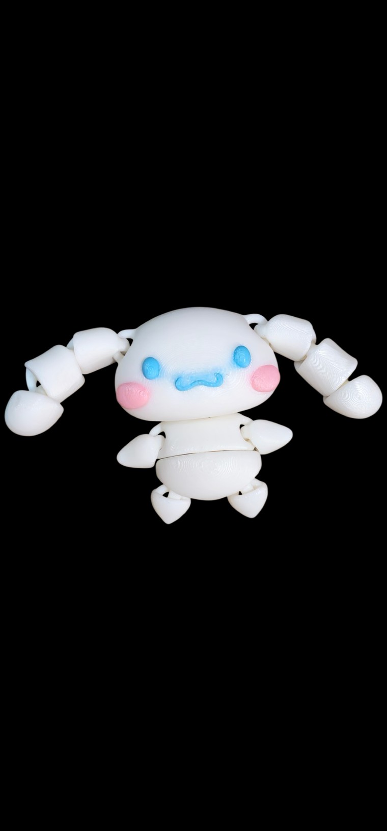 Mini white Cinnamoroll figure with long jointed ears, blue eyes and pink cheeks
