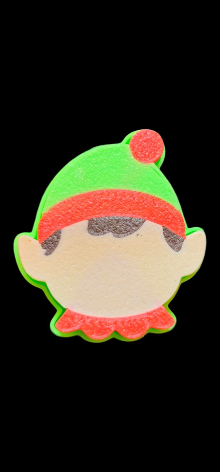 Green and red elf fidget clicker with a pom-pom hat and pointy ears