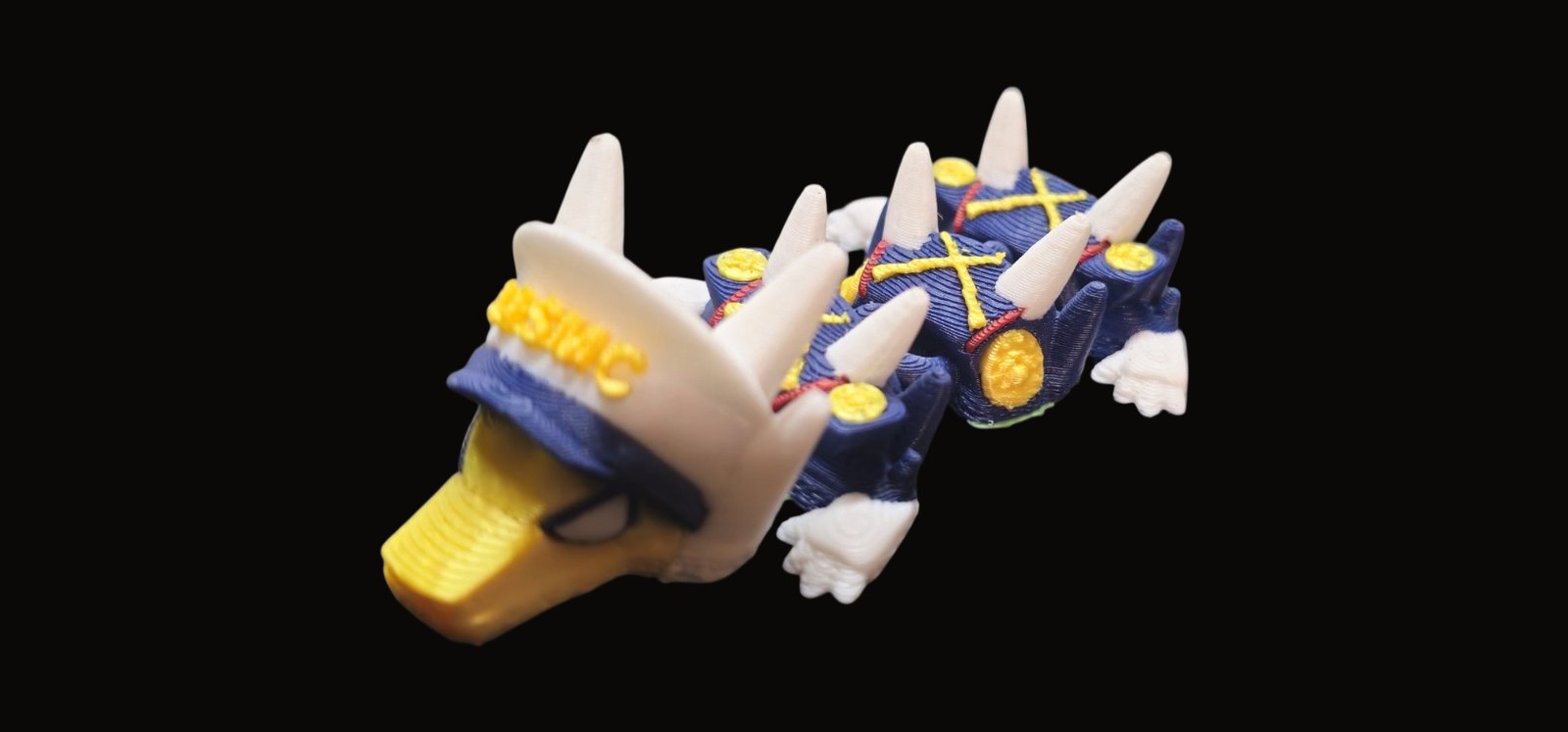 Navy blue articulated Marine dragon with a white USMC dress cap, gold buttons and crossed straps