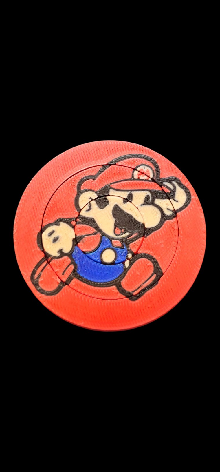 Round red Mario fidget spinner with rings that turn