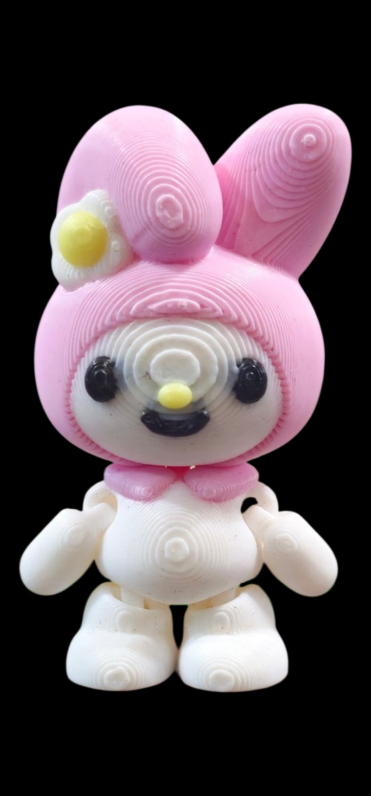 Mini pink My Melody figure with bunny-ear hood and a flower