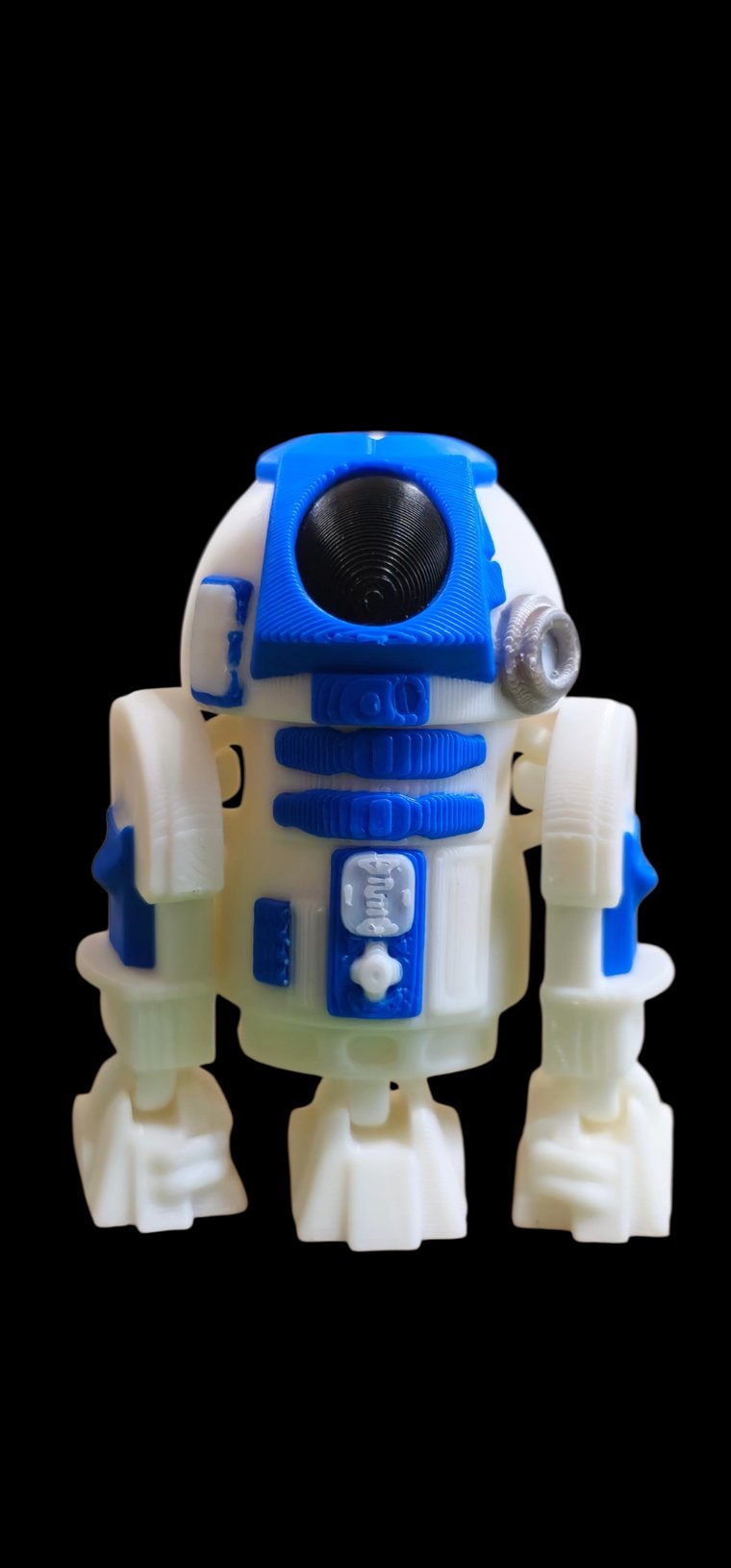Mini white and blue R2-D2 droid figure with a domed head