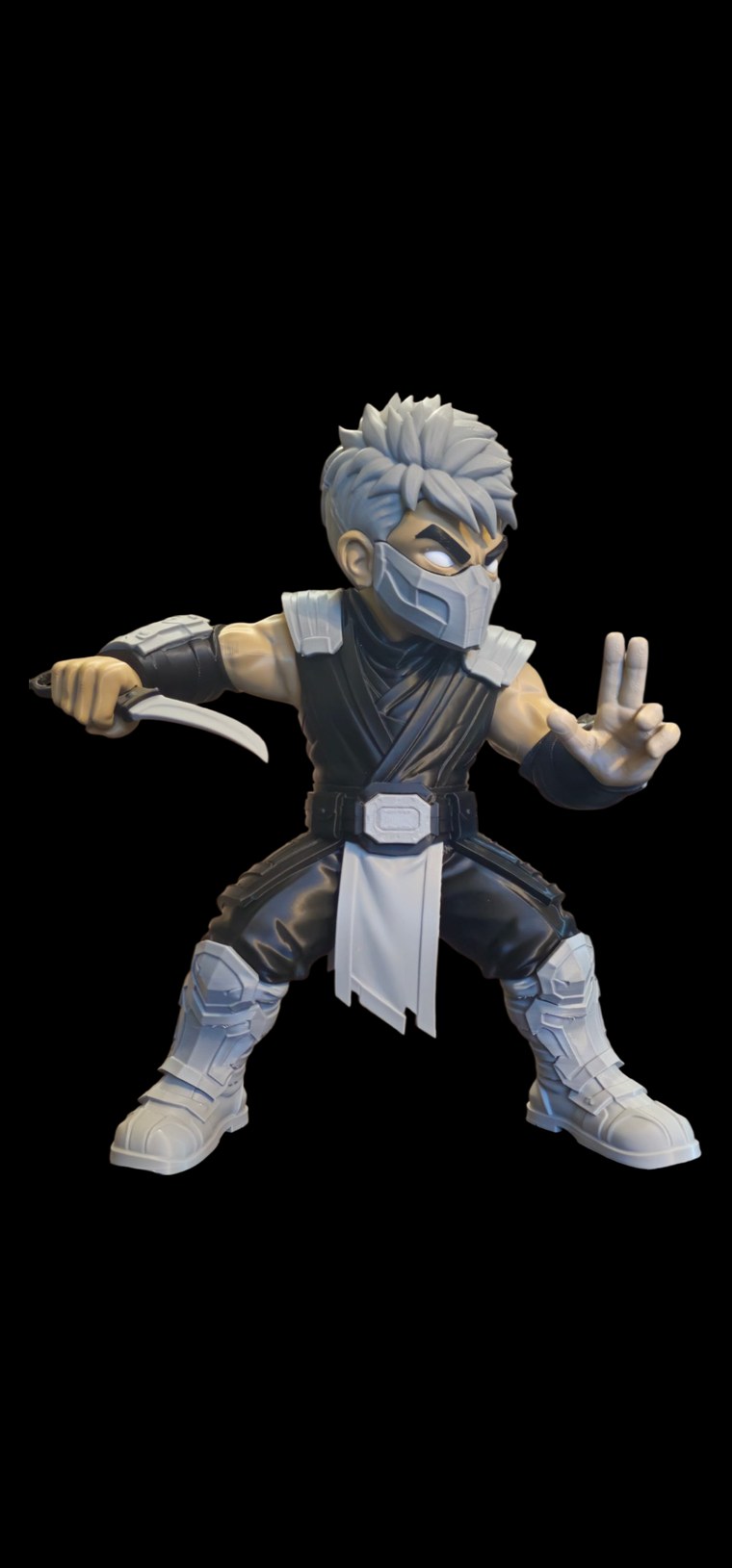Smoke from Mortal Kombat figure in a fighting stance with gray mask, spiky gray hair, black gi and a curved blade
