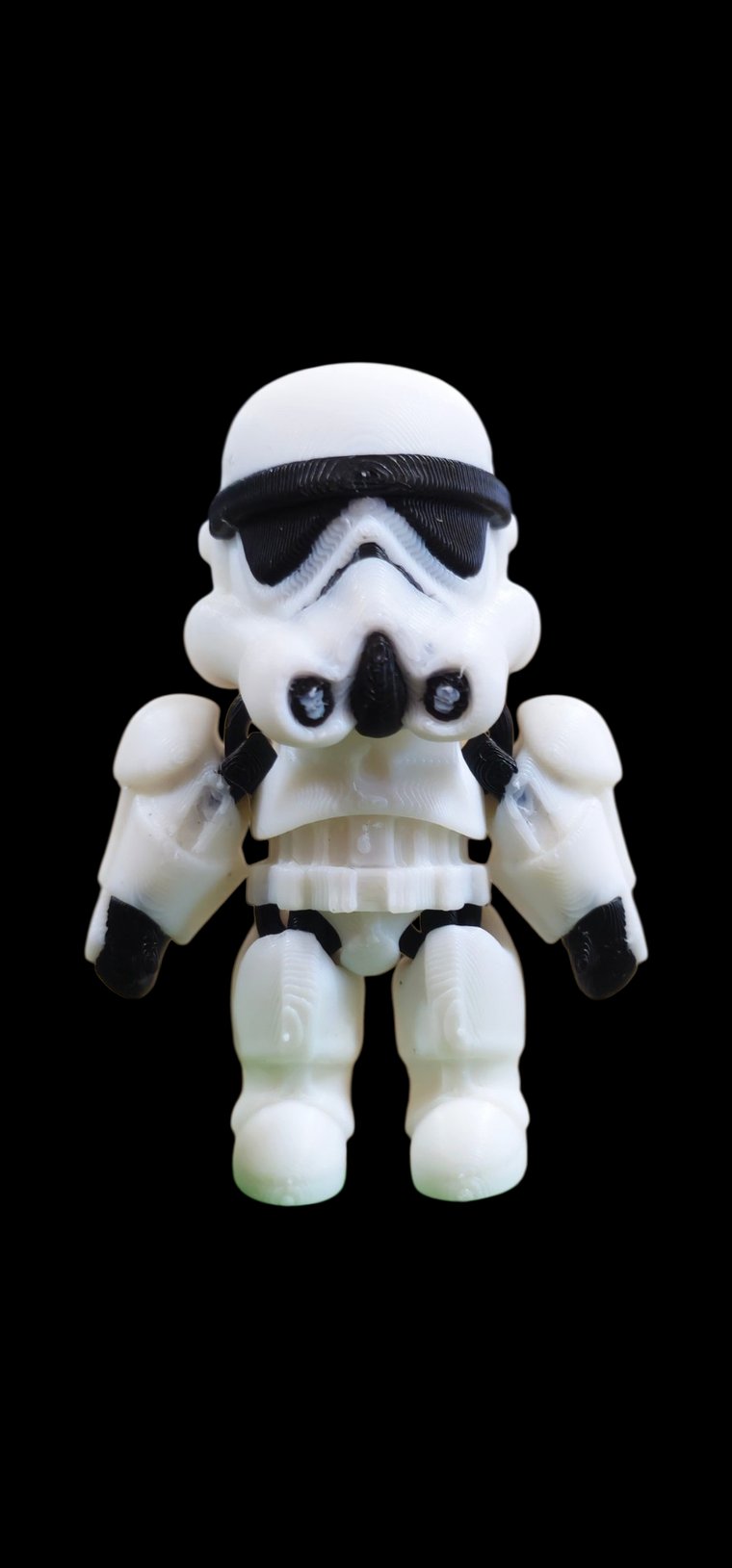 Mini white stormtrooper figure with black visor and details