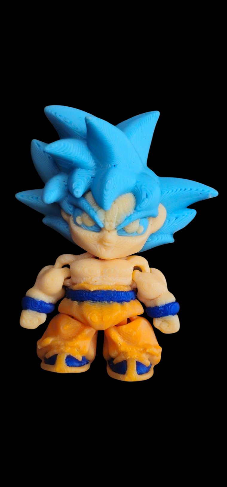 Mini Super Saiyan Blue Goku figure with blue spiky hair