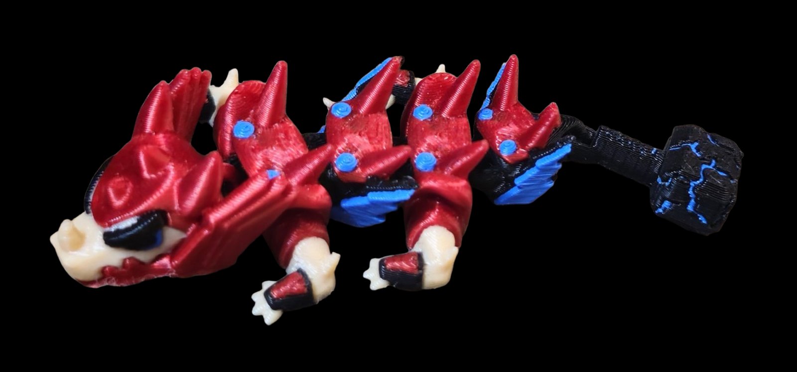 Red and black articulated Thor dragon with blue lightning and a hammer tail