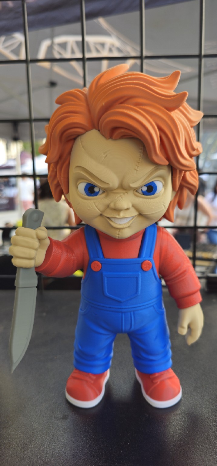 Chucky red-haired 3D printed figure in blue overalls